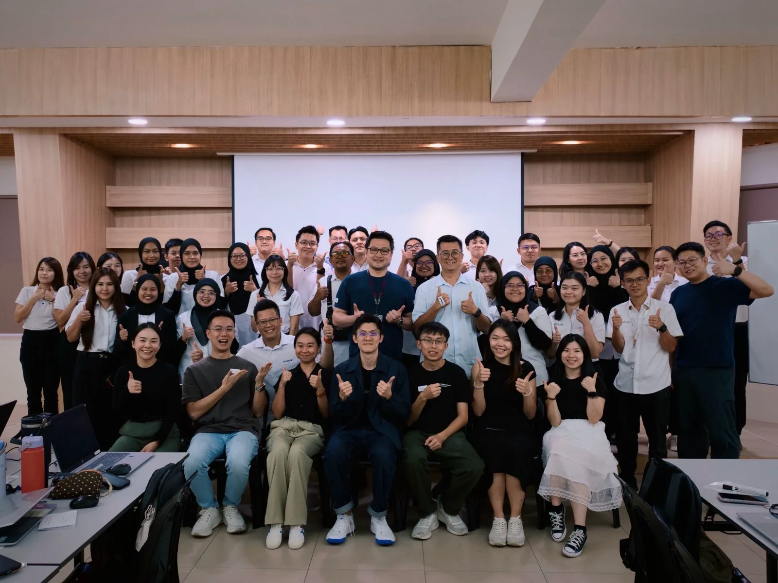 Marcus with participants at a property developer team workshop